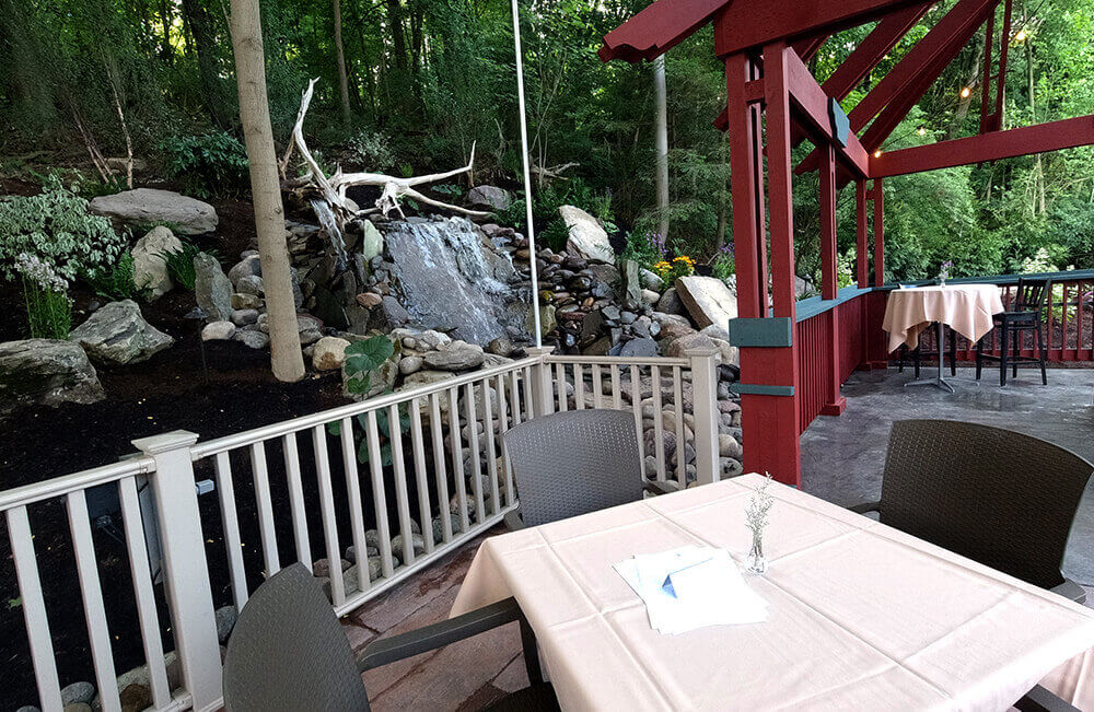 table overlooking a waterfall